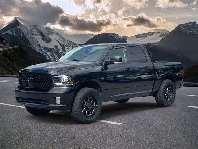 2018 RAM 1500 Night in Brilliant Black Crystal Pearlcoat — front three-quarter view