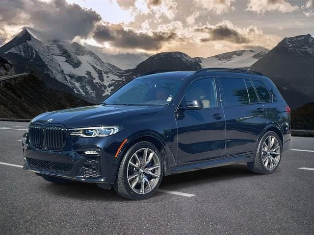 2021 BMW X7 M50i in Carbon Black Metallic — front three-quarter view